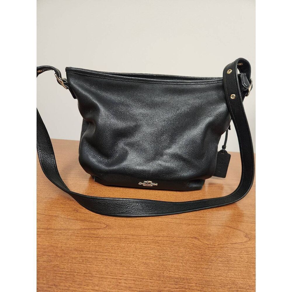 Coach Dufflette Pebble Leather Crossbody Bag Black 35775. See pictures for condi